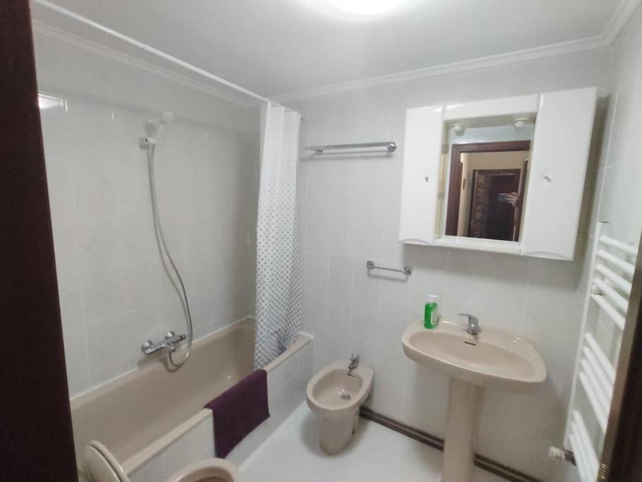 Appartamento Piso En Ajo Con Piscina Comunitaria Esterno foto